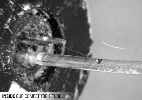 A competitor's gauge tube with clear signs of contamination inside of the sensor