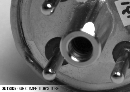 A competitor's gauge tube showing inconsistent soldering on a vacuum joint